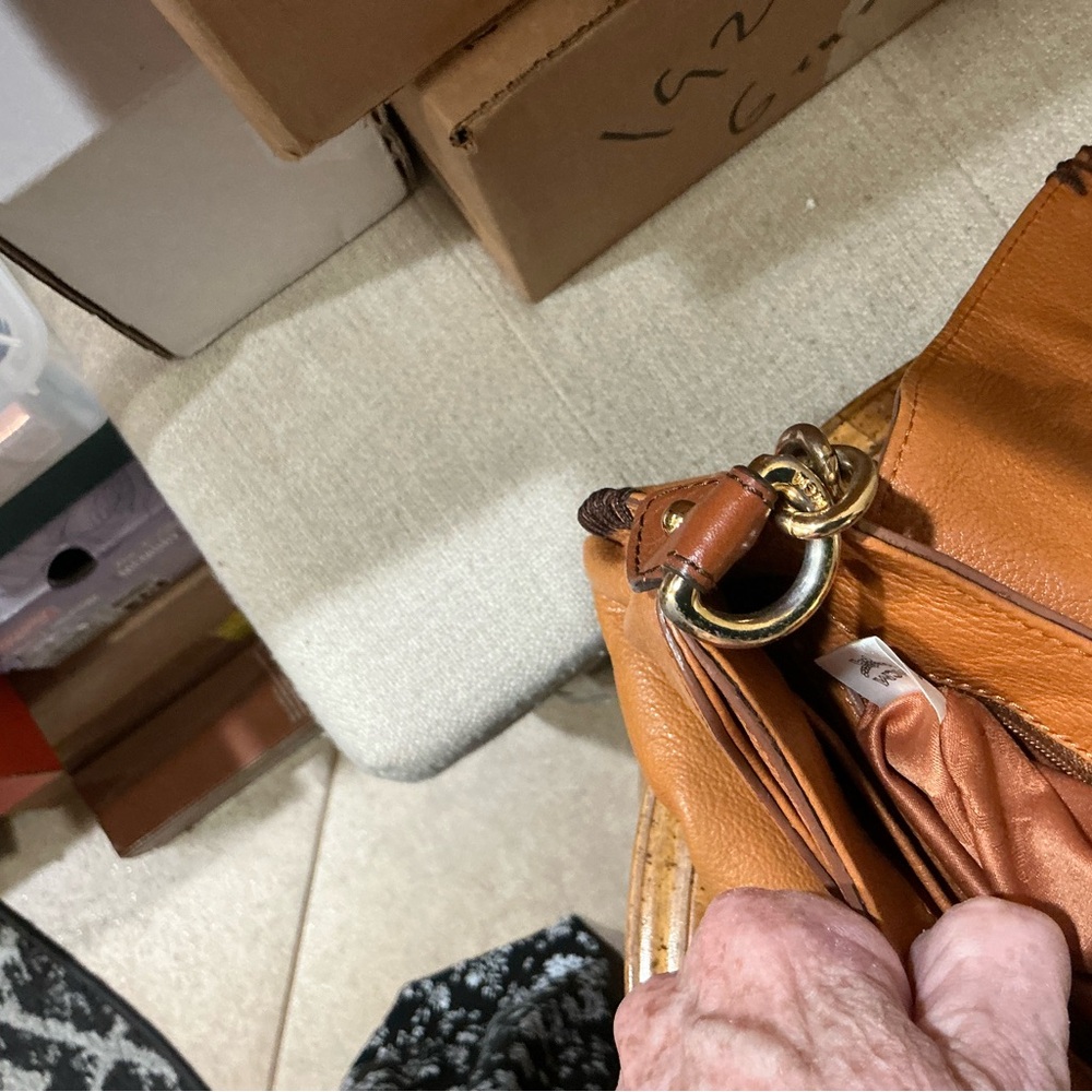 MCM shoulder bag in a tan or cognac featuring gathered flap and whipstitch trim - Picture 5 of 9